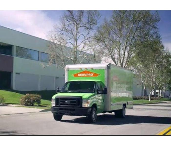 SERVPRO truck in front of a office building 
